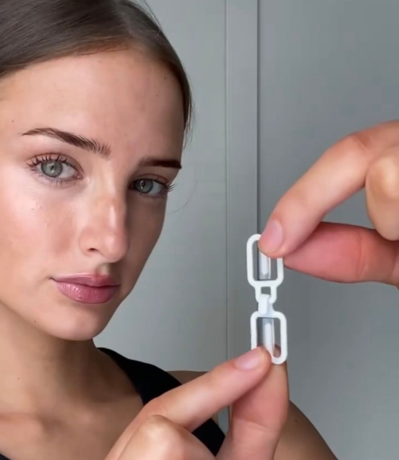 THE GOOD HOOK racerback bra converter clip hides bra straps under racerback tanks, dresses and other clothing so you can wear your existing bras with your favourite clothing styles without your bra straps showing.